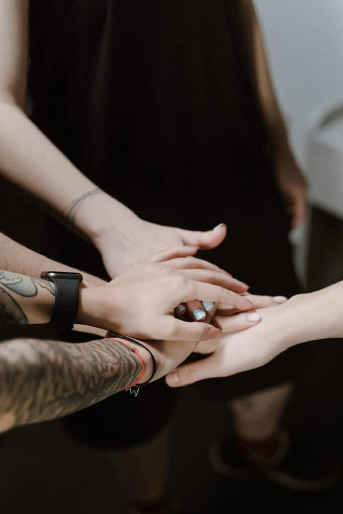 Community joining hands and supporting each other.